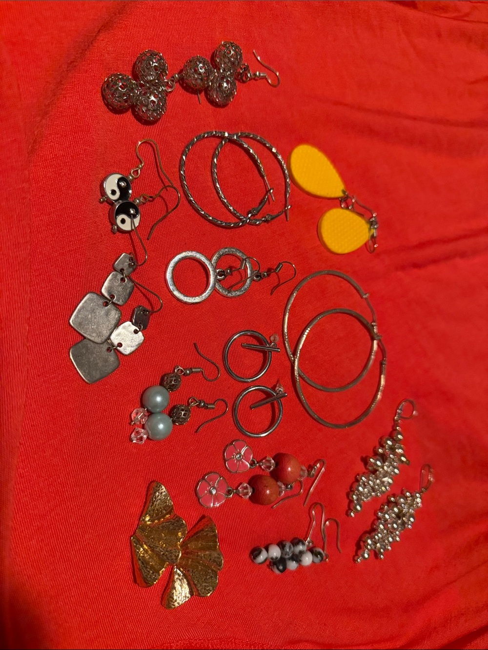 Set of 13 earring pairs (one goldtone metal, rest are silvertone metal)